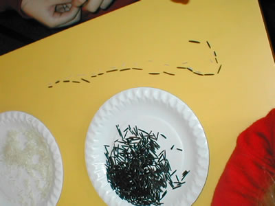 children counting grains of rice