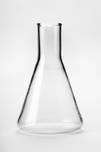 A chemical flask, with the bottom part a cone shape and the top part a cylinder shape.