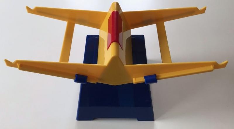 Balances A simple balance scale made of yellow plastic with a blue base.