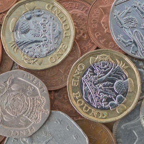 British coins in a pile.