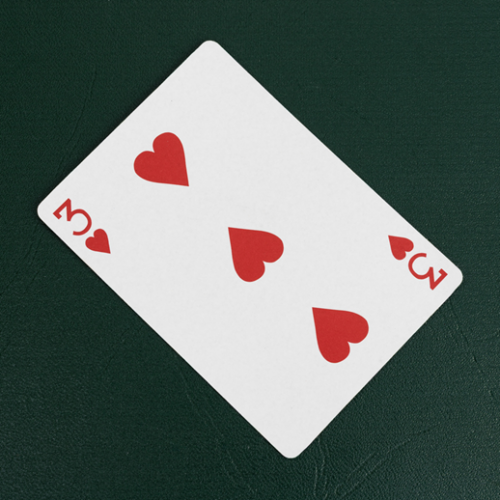 The three of hearts playing card on a green background.