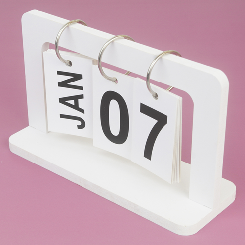 The date January 7th on a flip calendar, with a purple background.