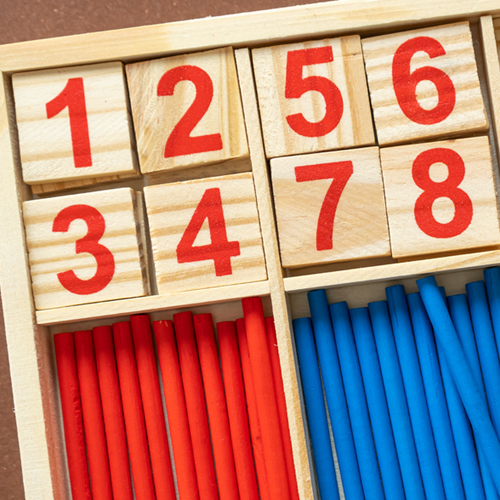 Counting sticks with the numbers 1 to 8 above them.