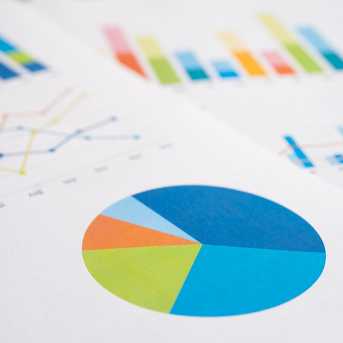 Printed graphs and pie charts.