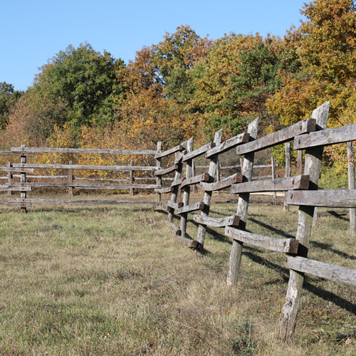 A fence around part of a field.