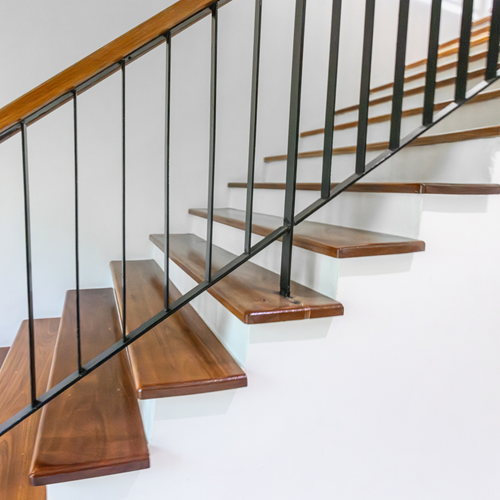 A side view of a wooden staircase.