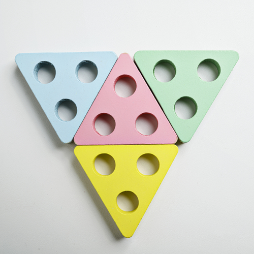 Four coloured triangles put together to make one big triangle.