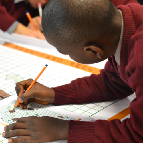 Student working on Maths and Sport roadshow activity