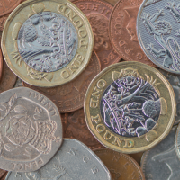 British coins in a pile.