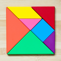 A square made of coloured triangles, squares and parallelograms.