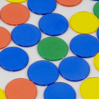 Coloured counters on a white background. One green counter is surrounded by six blue counters.